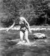 Barbara bathing in stream at Skjak